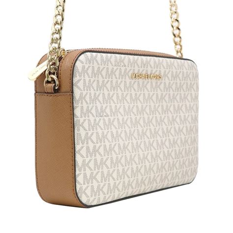 michael kors white sling bag|michael kors sling bag original.